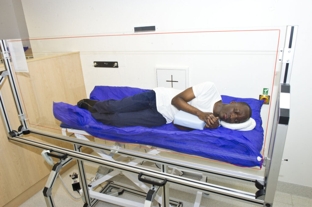 An image showing a patient lying on their side.