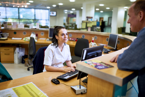 Photograph of the radiotherapy main reception desk.