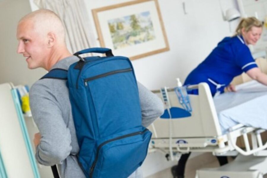 Young man with a rucksack in ambulatory care unit